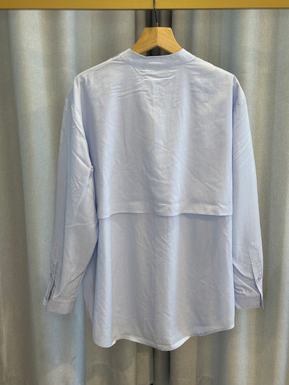 With Black hellblaue Bluse